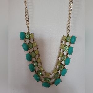 Gold jeweled statement necklace